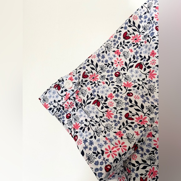 Adorable floral and butterfly print short sleeve button up blouse. - Picture 5 of 6